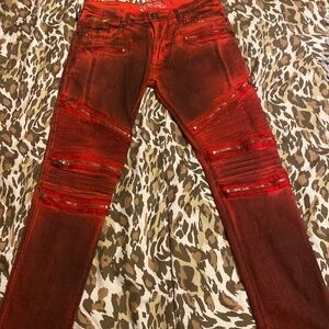men red jeans with black highlights.